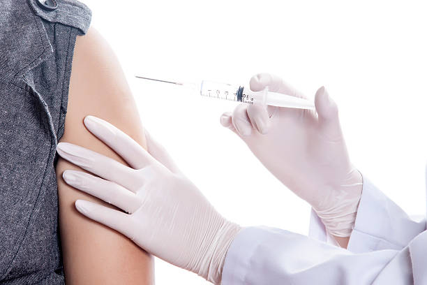 istock Doctor / Nurse holding a syringe give an injection 177506191