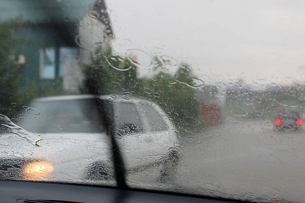 istock Raindrops on the car windshield in rainy drive. 177506204