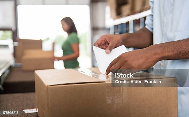 Labeling A Box Stock Photo - Download Image Now - Labeling, Box - Container, Shipping