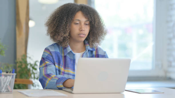 istock Young African Woman Working on Laptop 1775075086