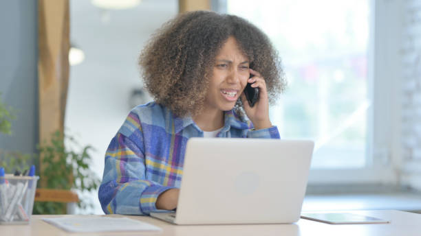 istock Upset Young African Woman Arguing on Phone Talk 1775077250