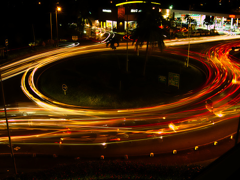 Heavy traffic at night on a roundabout