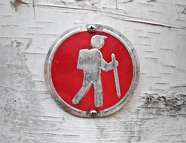 Hiking Symbol on Tree stock photo