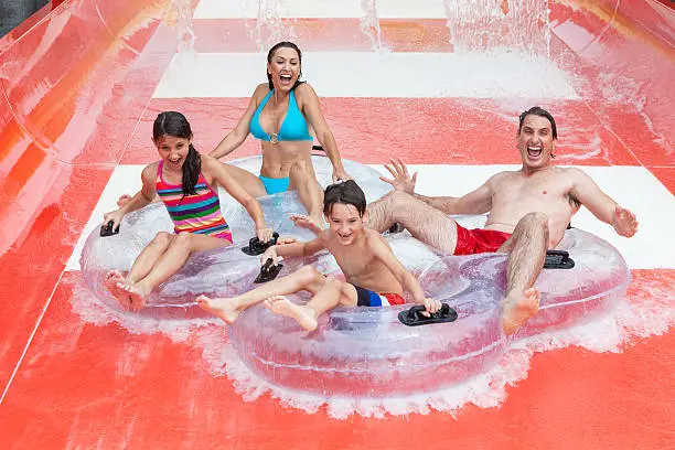 Photo of Mother Father Son Daughter Child Family Water Park