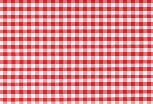 Red and white classic checked tablecloth texture with copy space