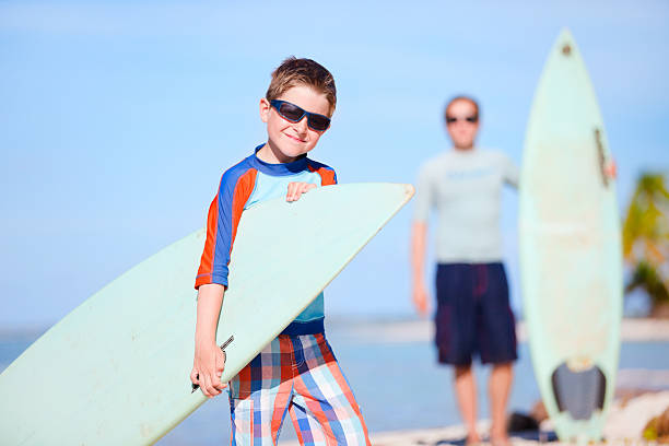 istock Father and son with surfboards 177509390