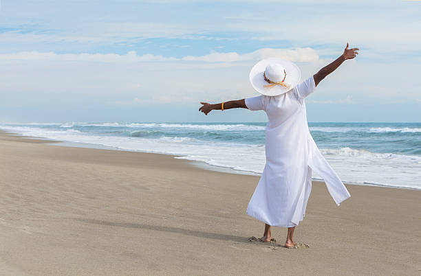 istock Happy African American Woman Dancing on Beach 177510713