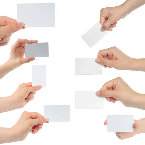 istock Hands hold business cards 177511412