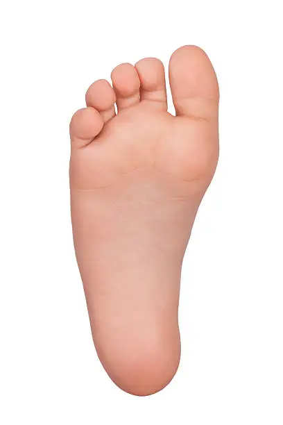 Bare foot child on a white background