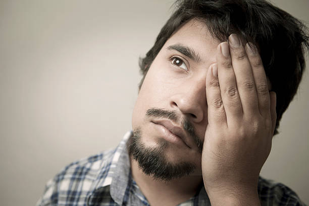 istock Sad worried young man with hands on face. 177511683