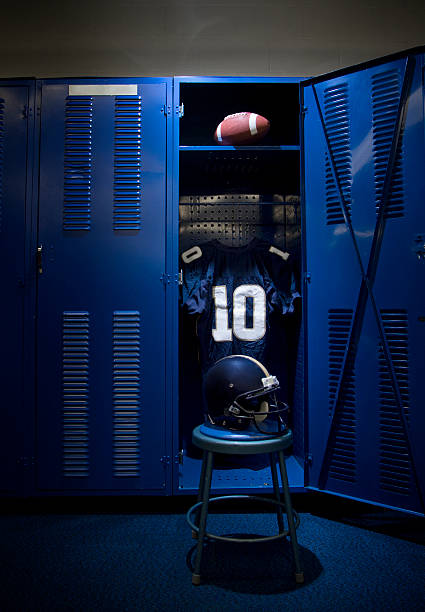 istock Opened blue locker containing a football and blue jersey 177511934