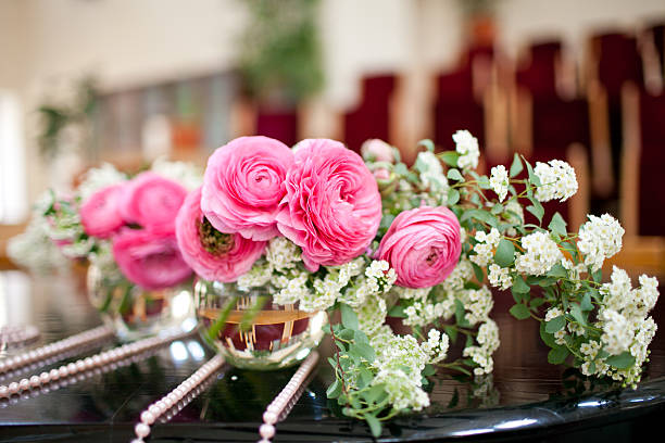 istock flowers - tables set for wedding 177512581