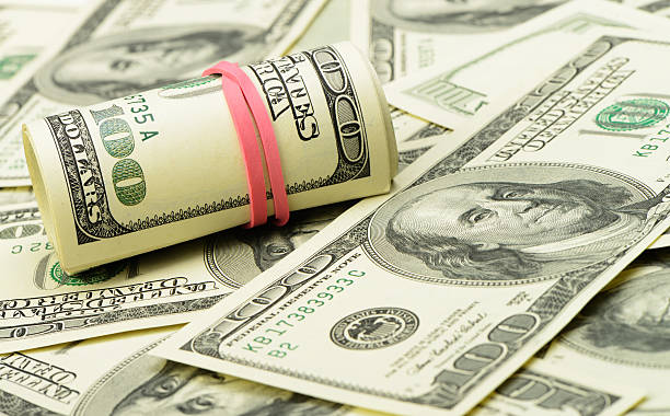 Rolls of dollars stock photo