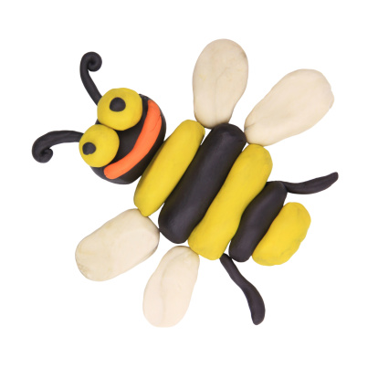 Isolated plasticine smiling bee on the white