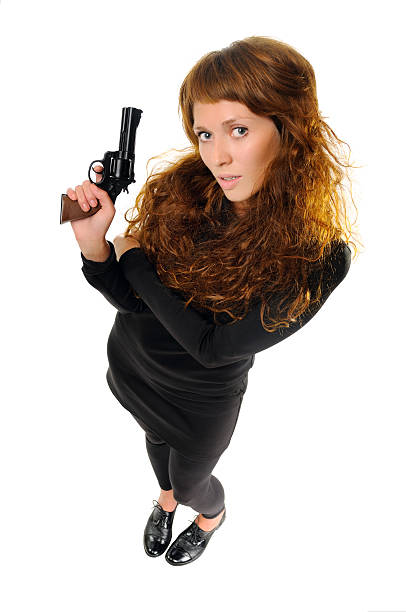 istock Woman with a gun 177513310