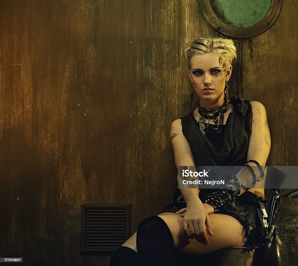 Blond girl in a bunker Abandoned Stock Photo