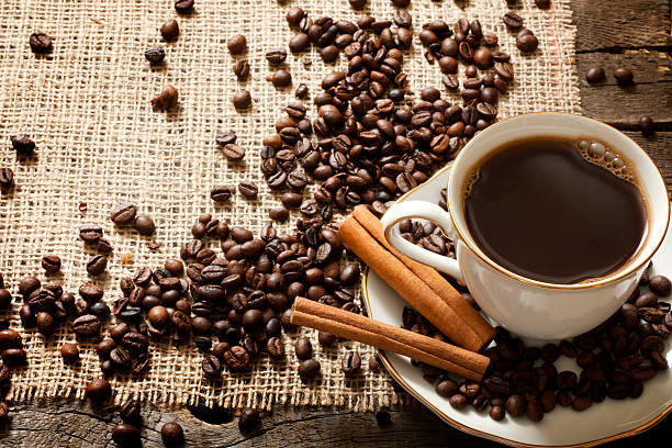istock Cup of coffee with beans vintage background 177514154