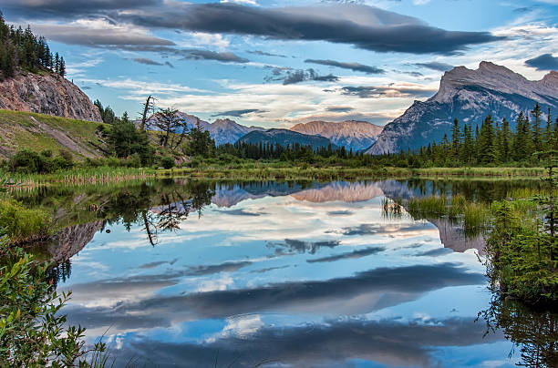 Dramatic Clouds Reflection in Vermilion Lake stock photo