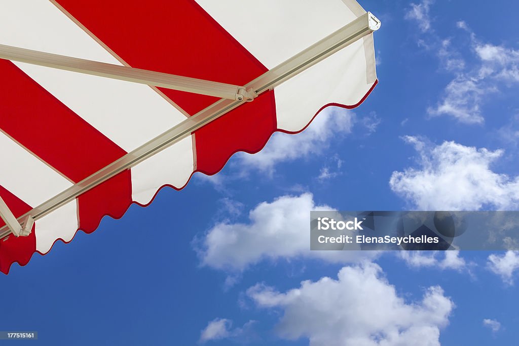 Awning over bright sunny blue sky Awning Stock Photo