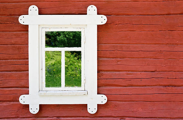 istock Decorative white window on an old farmhouse wall in Scandinavia 177516128