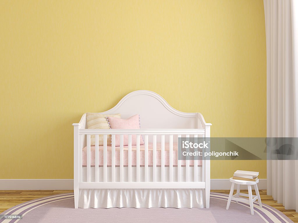 White crib in the interior of a yellow baby nursery Interior of nursery with crib near empty yellow wall. 3d render. Domestic Room Stock Photo
