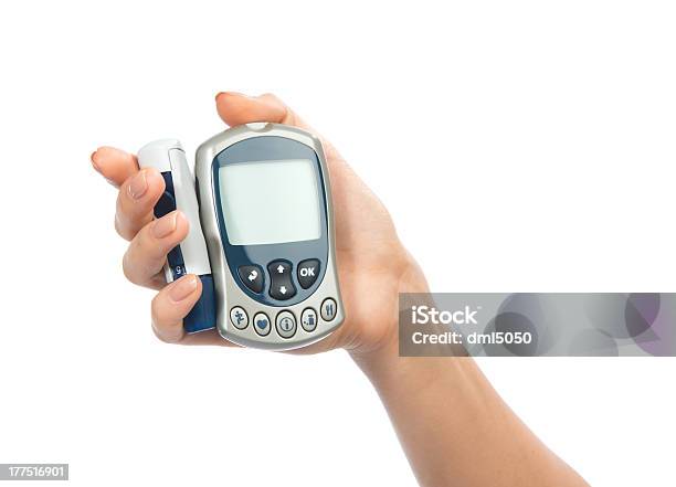 Foto de Glucometer Na Mão Para Medir Glucose Nível Exame De Sangue e mais fotos de stock de Dedo humano