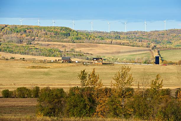 istock Wind turbines and farm 177517122