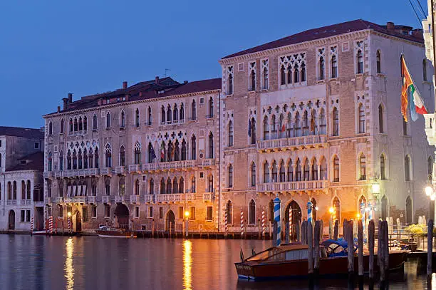 buildings in the light of dawn in the canal grande invenezia