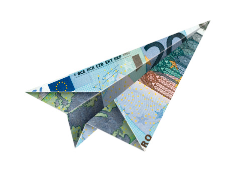 plane made out of twenty euro bill with saved clipping path