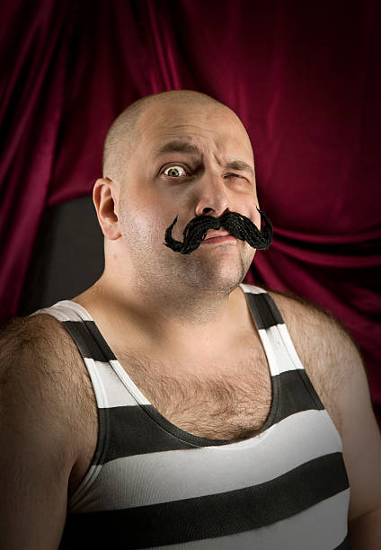 istock Vintage circus strongman with big mustache 177518947