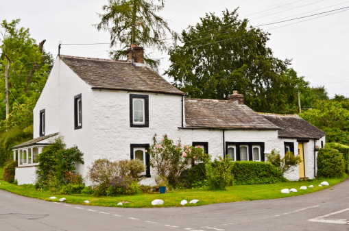 A traditional whitewashed cottage in the English lake District