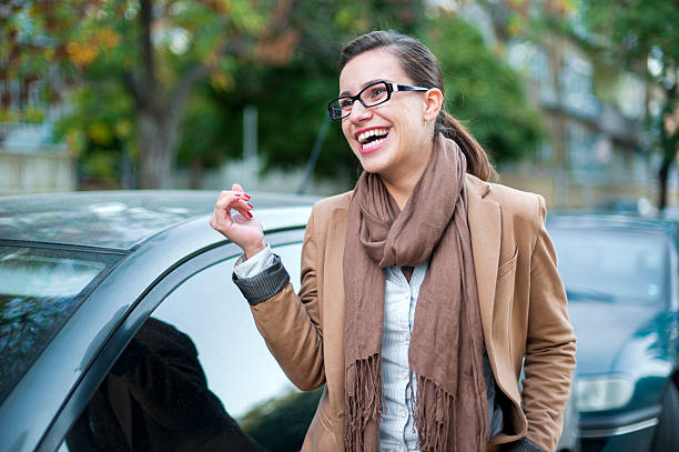 istock Young woman standing next to her car 177519213
