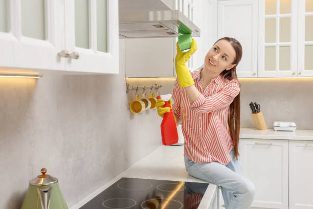 istock Spring cleaning. Young woman tidying up kitchen at home 1775200200