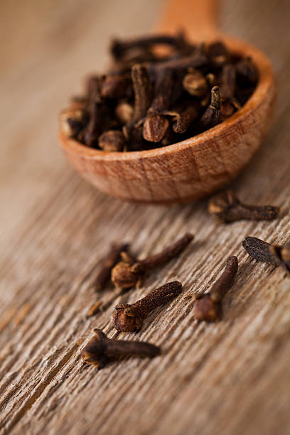 istock cloves in wooden spoon 177520738