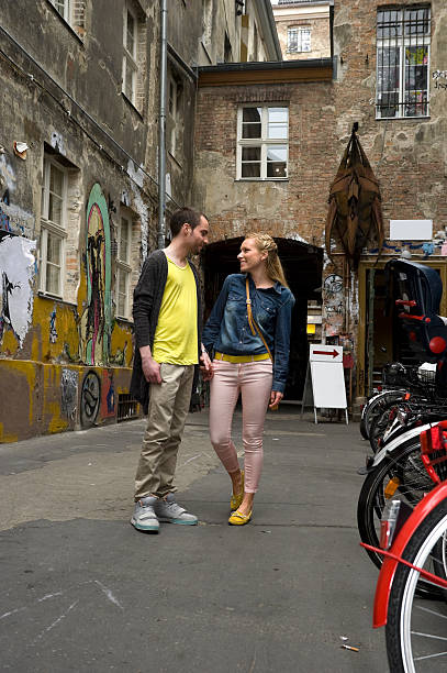 istock Young couple walking in the street 177522835