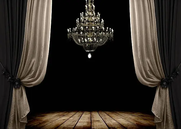 Image of grunge dark room interior with wood floor and chandelier. Background
