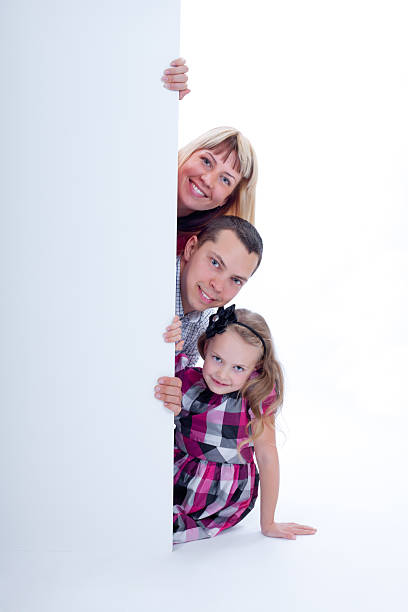 istock Smiling family peek out 177523495