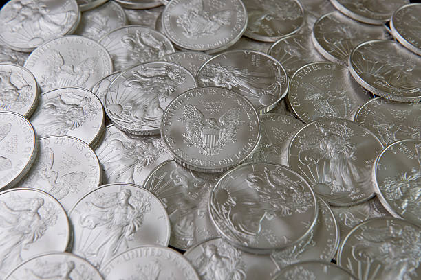 Silver Coins 1 ounce pure silver coins ounce stock pictures, royalty-free photos & images