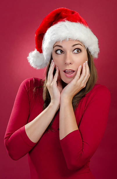 istock Happy woman with Santa Hat 177523981