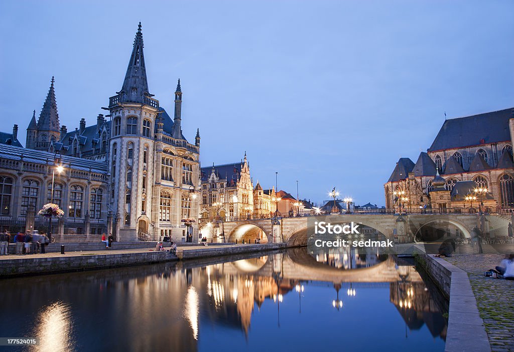 Gent - Post palace and Michael s bridge "Gent - West facade of Post palace and Michael s bridge with the canal in evening from Graselei street on June 24, 2012 in Gent, Belgium." Architecture Stock Photo