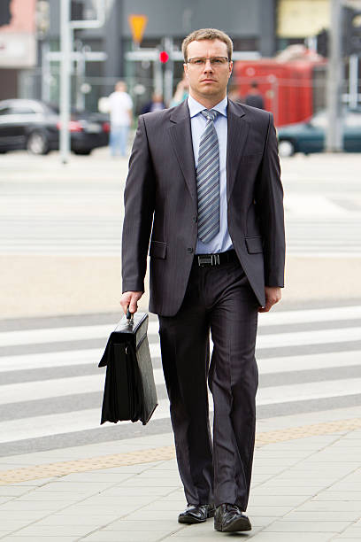 istock Businessman walking through the streets 177525518