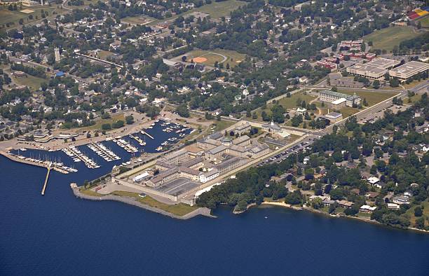 Kingston Shoreline "Lake Ontario shoreline aerial, Yacht club and Penitentiary with the Queens's University grounds in the background Kingston Ontario Canada" kingston harbour stock pictures, royalty-free photos & images