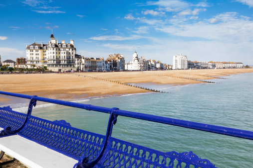 Eastbourne beach and seafront as seen from the pier, East Sussex England UK