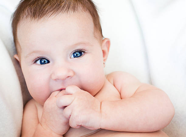 istock baby girl sitting 177526503