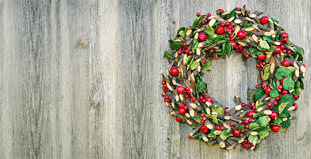 istock Rustic Xmas wreath on a wooden background 177526560