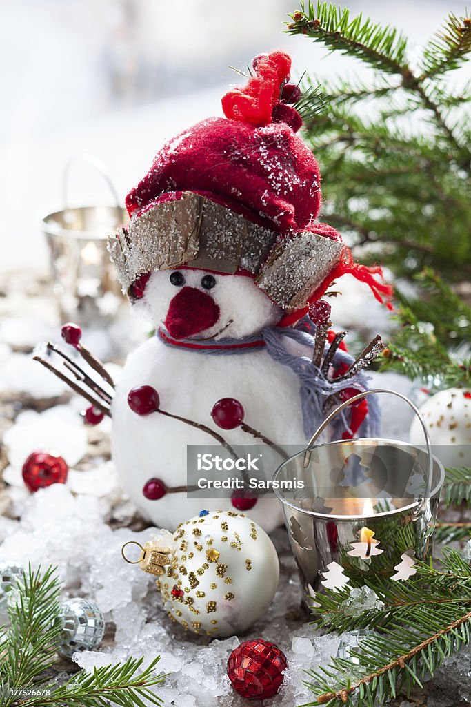 Christmas Decoration "Christmas Decorations with snowman,candles and christmas baubles" Branch - Plant Part Stock Photo