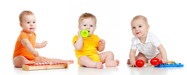 istock Children playing with musical toys. Isolated on white background 177527981