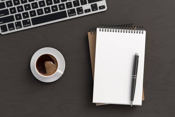 istock Notebook mockup. Blank workplace notebook. Spiral notepad on dark wooden desk 1775282018
