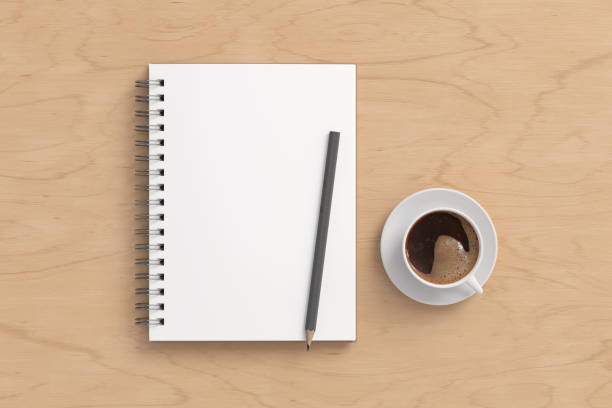 istock Notebook mockup. Blank notebook, coffee and pencil. Spiral notepad on wooden desk 1775284930