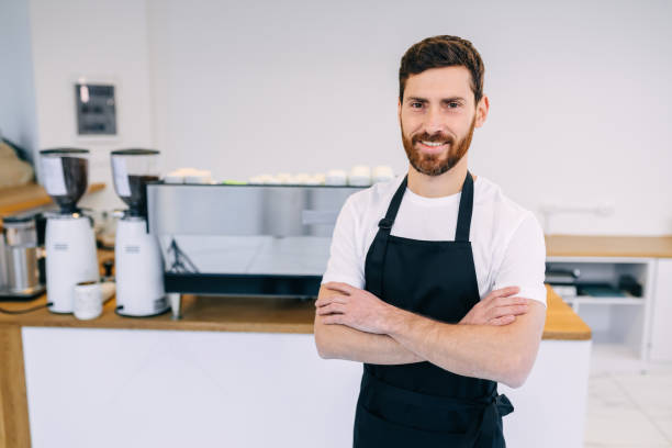 istock a man in uniform smiles and shows thumbs up, standing against th 1775286647